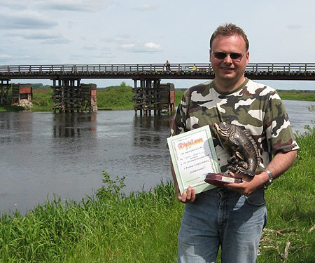Krzysztof Sychowicz z nagrodą